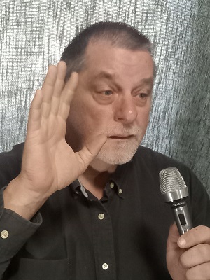 Jerry Penner, Speaker and Financial Coach, hand up